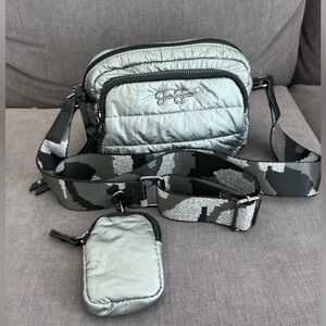 Jessica Simpson cross body bag. Size medium. Color silver.